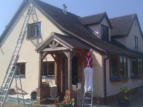Exterior house painting in progress