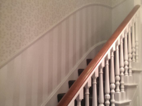 Staircase wallpapering and painting