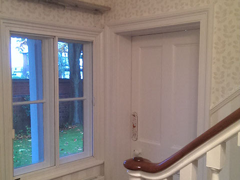 Hallway wallpaper and trim work