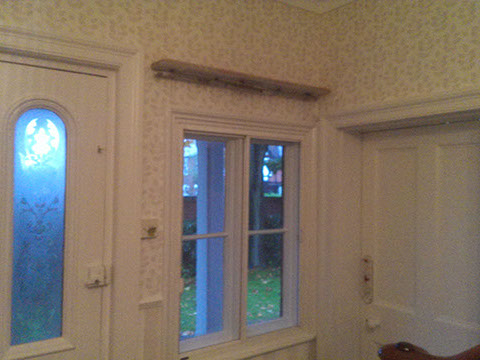 Interior wallpapering around doorway