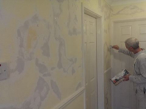 Wall preparation and painting in hallway