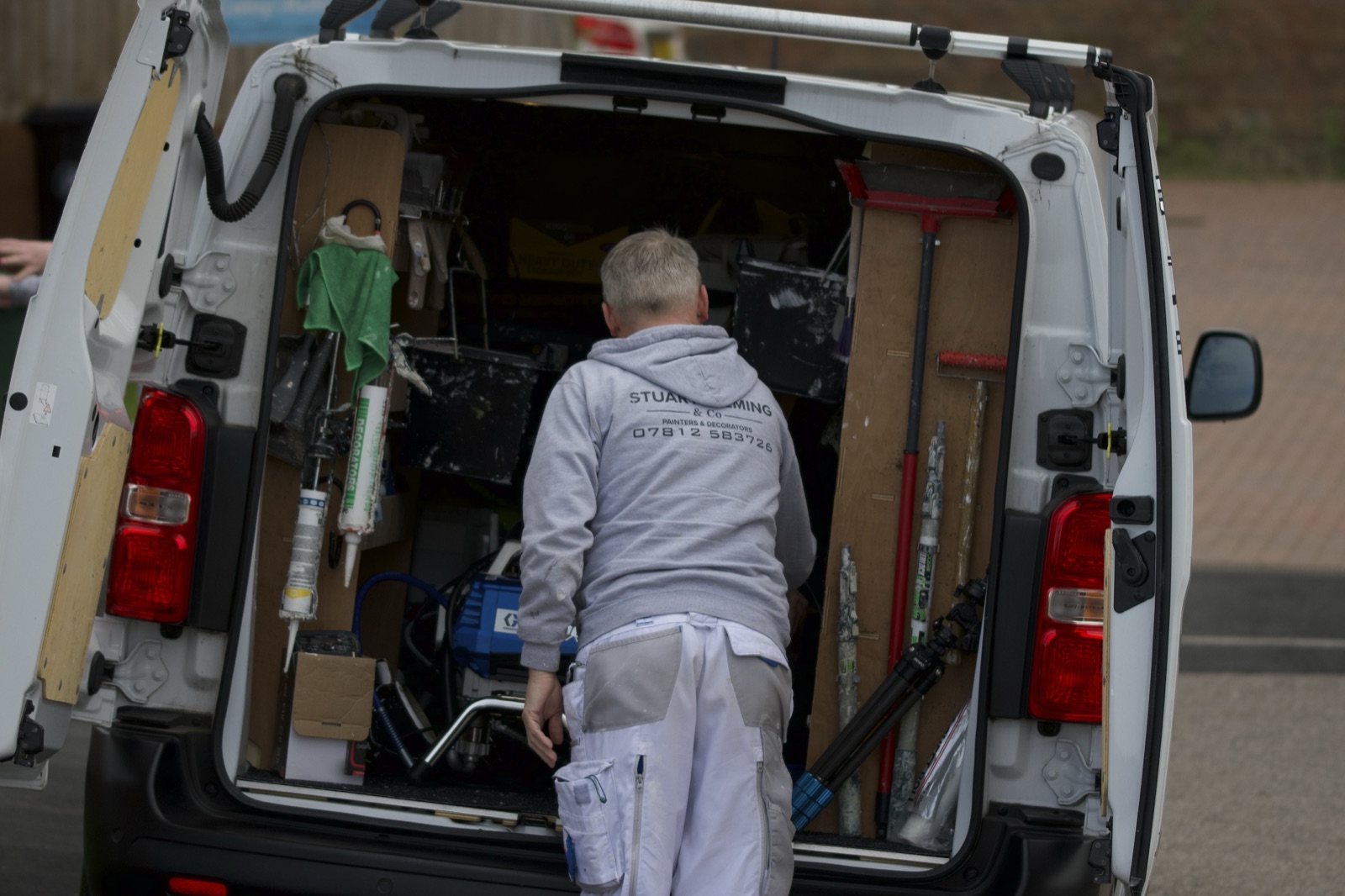 Stuart preparing tools for a decorating job